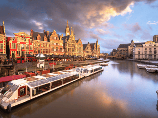 DMC in Belgium arranging scenic boat tours along Ghent’s illuminated canals