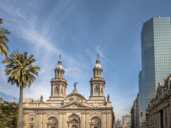Santiago Metropolitan Cathedral at Plaza de Armas surrounded by city architecture – DMC Chile