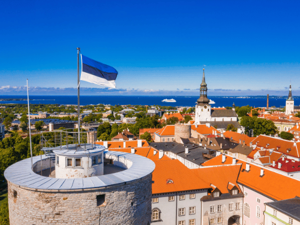 DMC in Estonia – Estonian flag flying atop Tall Hermann Tower in Tallinn.