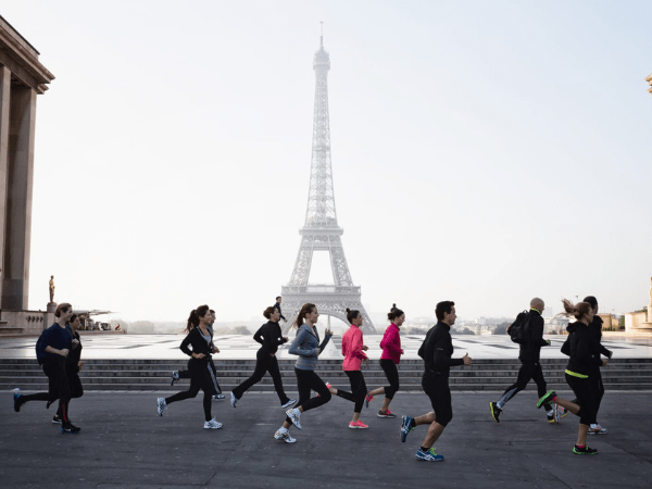 Team building run in front of the Eiffel Tower, France DMC event