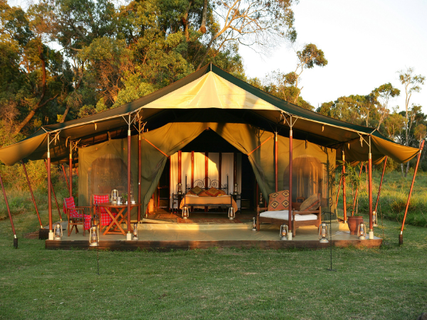 A luxurious stay at Elephant Pepper Camp, Kenya, surrounded by pristine wilderness, arranged by a DMC in Kenya.