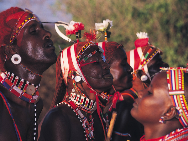 Samburu warriors performing a traditional dance, a cultural highlight to explore with a DMC in Kenya.