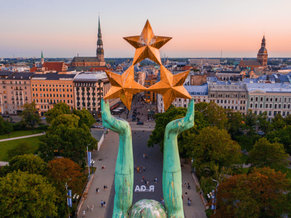 DMC in Latvia – Aerial view of the iconic Freedom Monument in Riga.