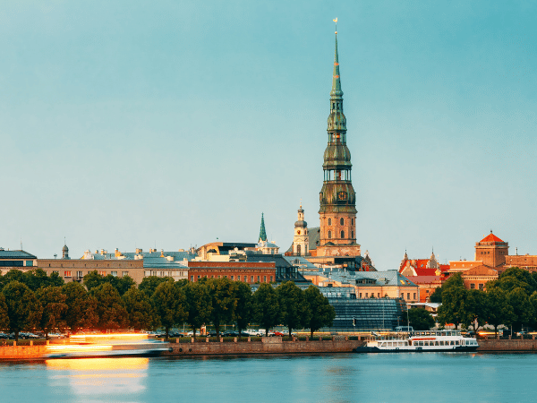 DMC in Latvia – St. Peter’s Church and historic Riga skyline along the Daugava River.