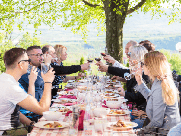 Authentic Serbian dining experience with friends, arranged by DMC Serbia for cultural immersion