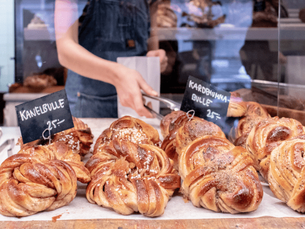 DMC in Sweden – Traditional Swedish pastries Kardehumna and Kanelbulle (cinnamon rolls) on display.